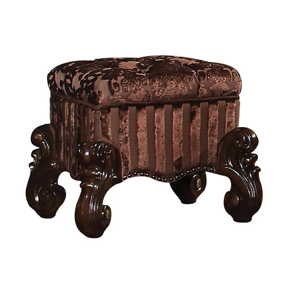The Versailles vanity stool is the perfect accent to create the style of royalty your bedroom has been needing. This vanity stool crafted in wood with cherry oak finish was inspired by old European design with an upholstered tight seat cushion with welted trim and intricate wood carvings on the scrolled legs.