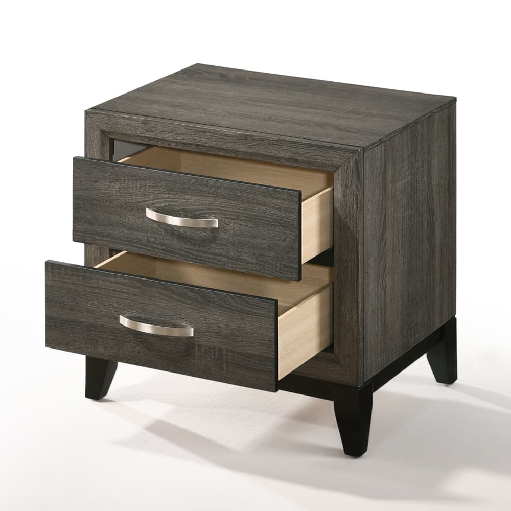 The forward design and clean lines of the Valdemar nightstand make it an ideal addition to any bedroom. This contemporary nightstand features a unique and subtle weathered gray finish. The nightstand features two large drawers that allow for storage of all kinds of household items.  With brushed nickel accents and tapered legs this transitional piece will add a touch of modern elegance and style to any bedroom.