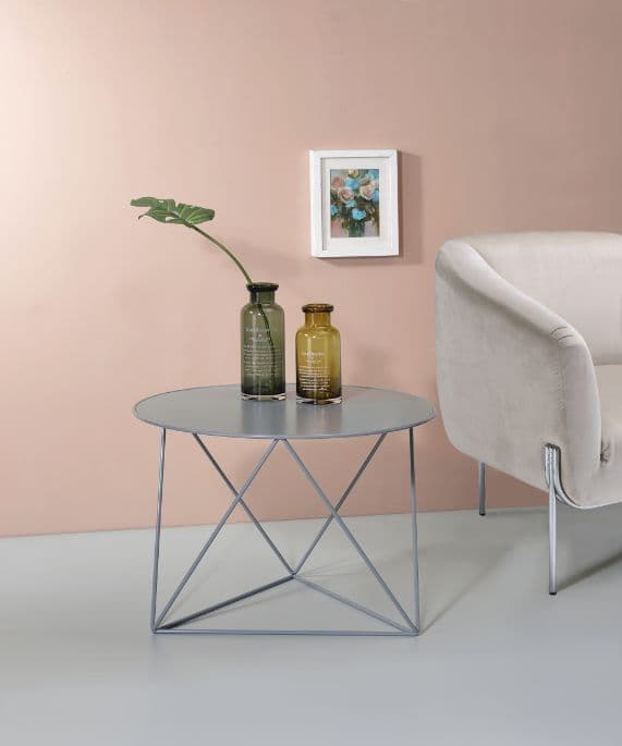 Bring dimension, depth and distinctive visual appeal with this modern geometric design.  The accent table boasts a cool and fun look.  Round table top paired with irregular metal base adds a uniquely attractive contrast to this table.  It's powder coating provides a beautiful, durable finish and supports four different colors including: blue, yellow, white, gray. Use the Epidia Accent Table to achieve a youthful and bright decor scheme