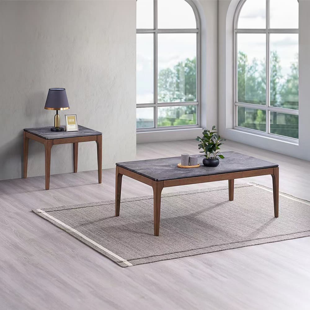 Elevate your living space with the Bevis Collection End Table, where timeless design meets sophisticated elegance. This coffee table pairs an engineered stone surface with the warm tones of a sturdy wooden base, creating a striking visual harmony that commands attention. Perfect for contemporary and traditional settings alike, its expansive top offers ample space for artful displays, casual gatherings, and intimate evenings alike. The Bevis Collection embodies a sense of refined luxury that turns everyday living into an extraordinary experience. Make this exquisite piece the heart of your home, where style and function blend seamlessly.